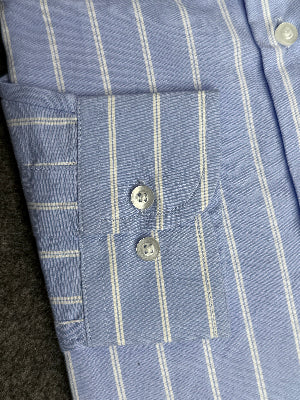 side angle view of sky blue poplin casual shirt